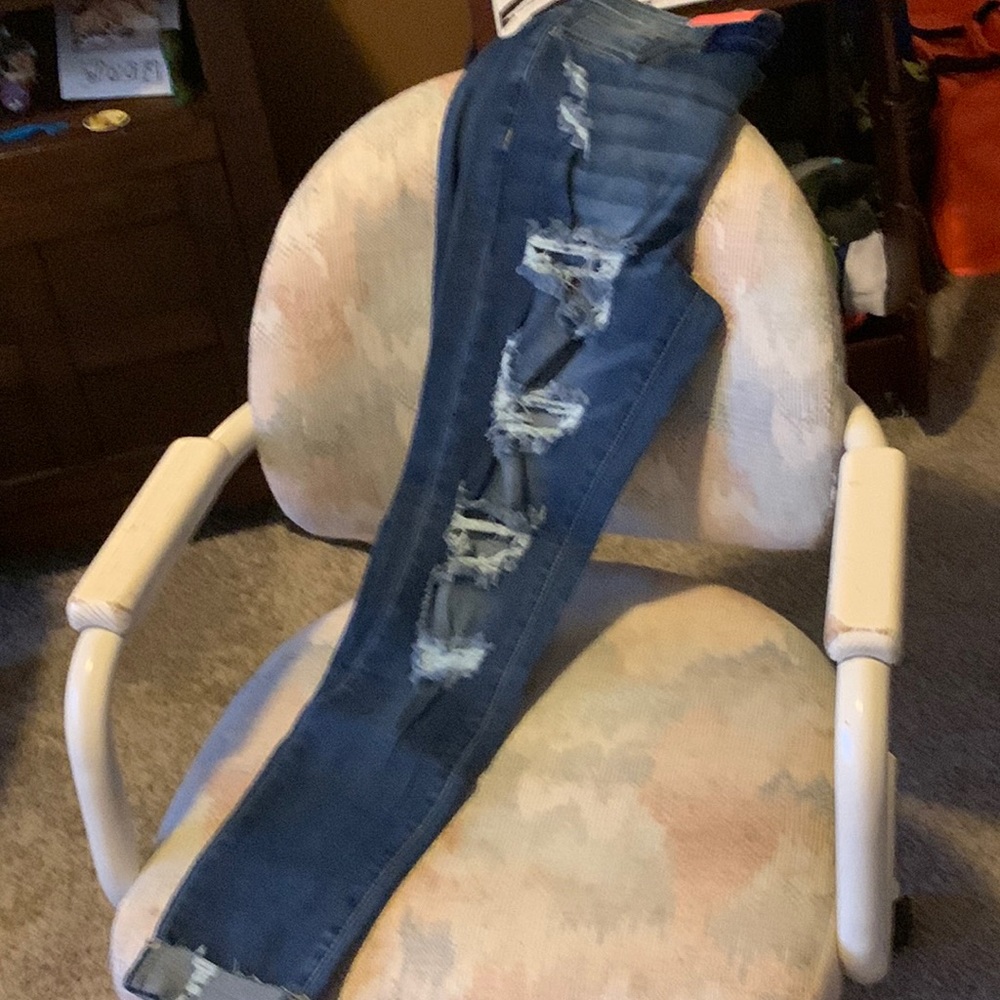 Flamingo made waist, ladder ripped, rolled skinny jeans